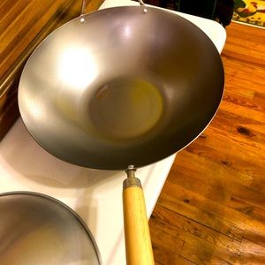 Never used carbon steel wok with instructions.
